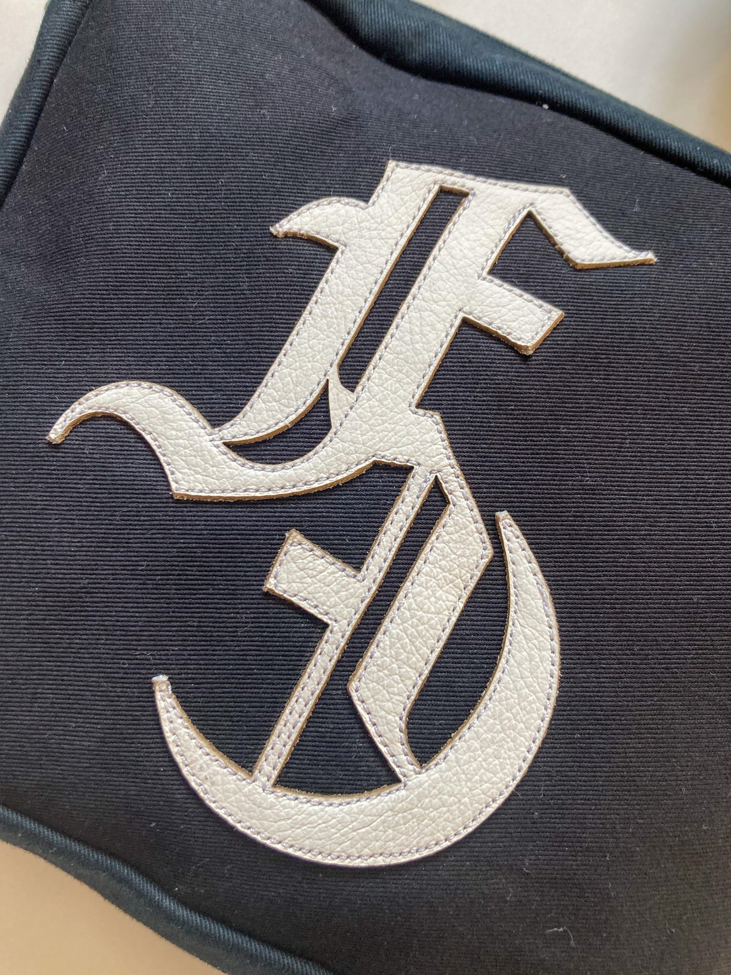 Leather FE logo bag